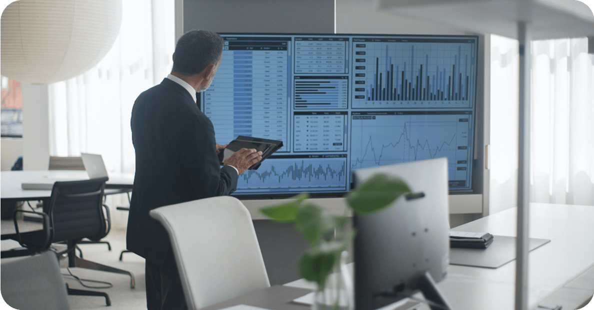 Man looking at statistics